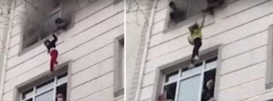 Мати викинула чотирьох дітей із вікна палаючої квартири (відео)